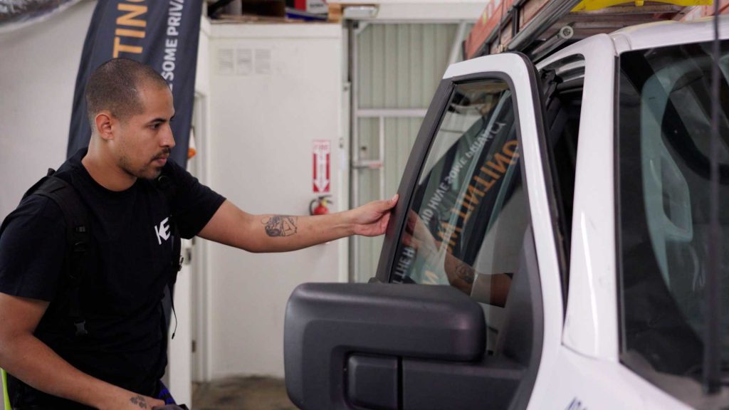 First Class Auto Center Tinter Checking Tint